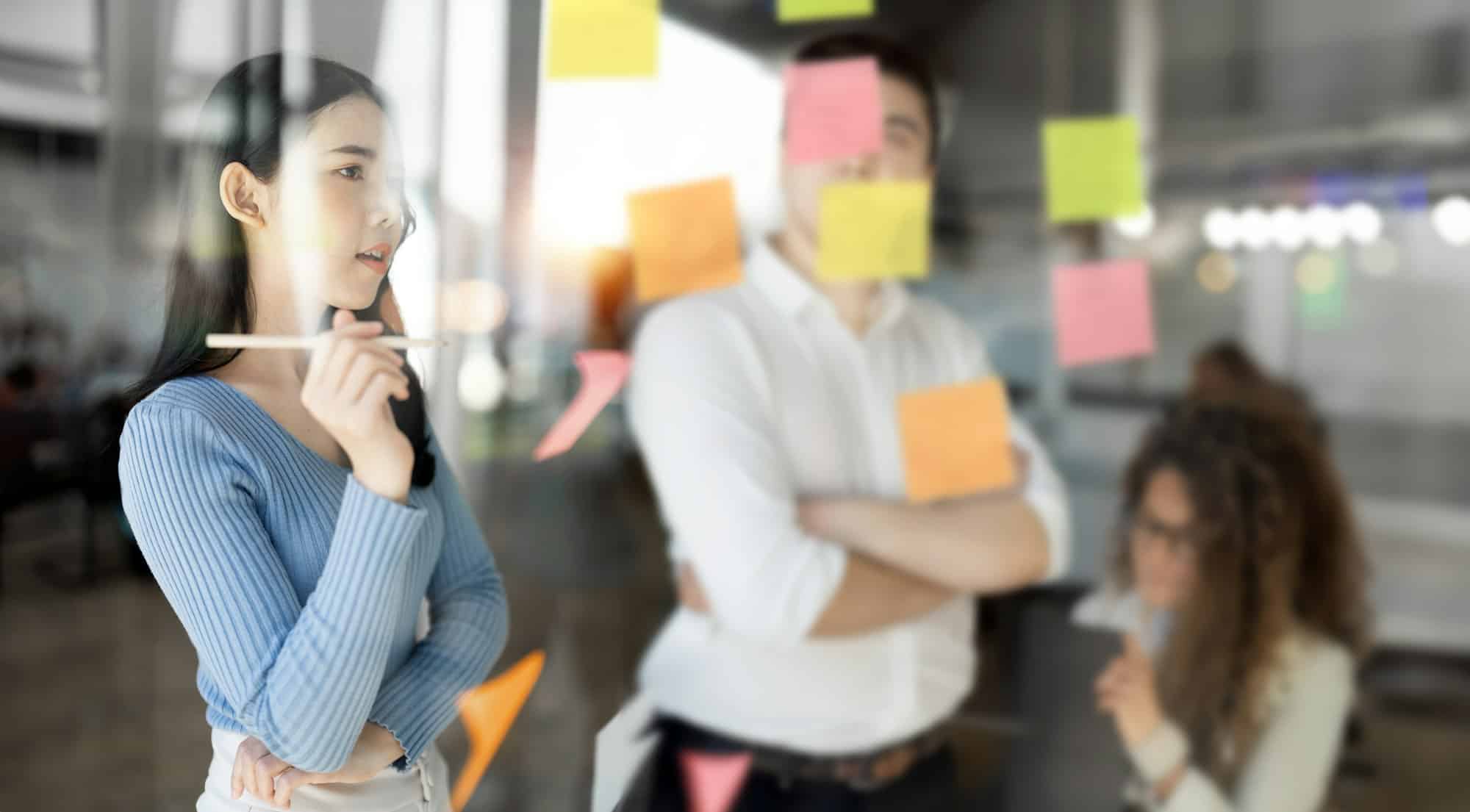 Young creative happy people entrepreneur on a business meeting in office